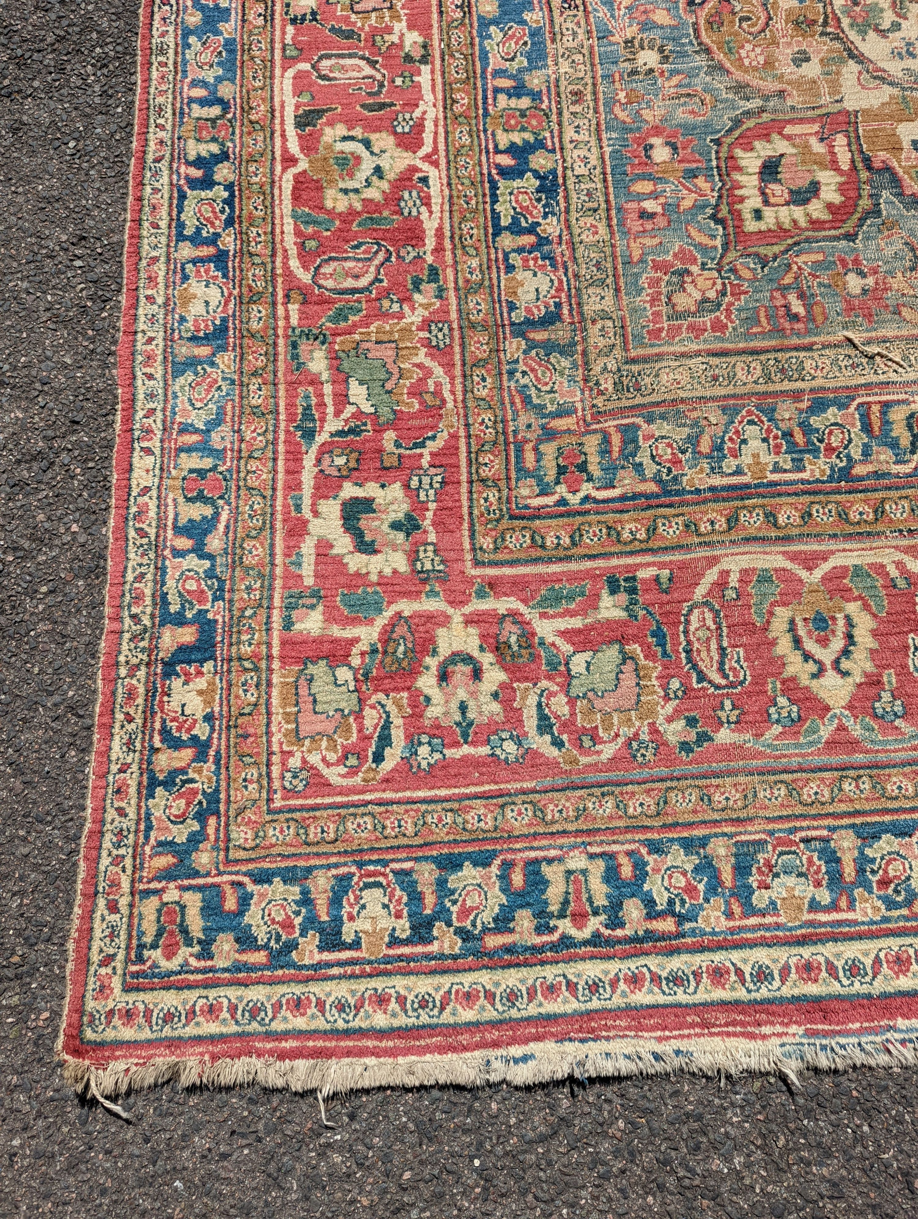 An Isfahan ivory ground carpet, 432 x 330cm
